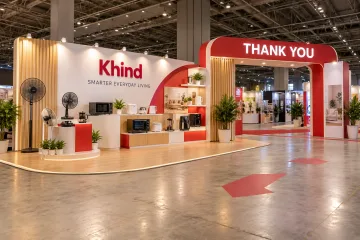 Khind home living roadshow with a stable freestanding event exit arch reading THANK YOU, a nearby home-appliance product wall and floor arrows for a temporary exhibition route