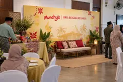 Munchy’s family raya gathering design reference with family festive hospitality portrait corner